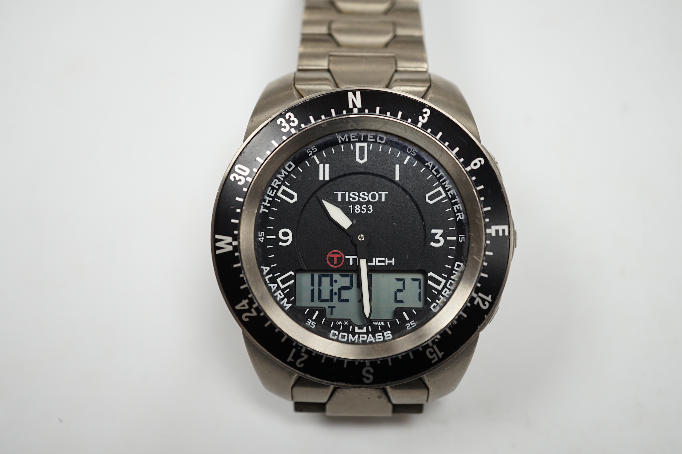 A gentleman's titanium Tissot Touch Expert analogue and digital quartz wrist watch, with box and pamphlets.